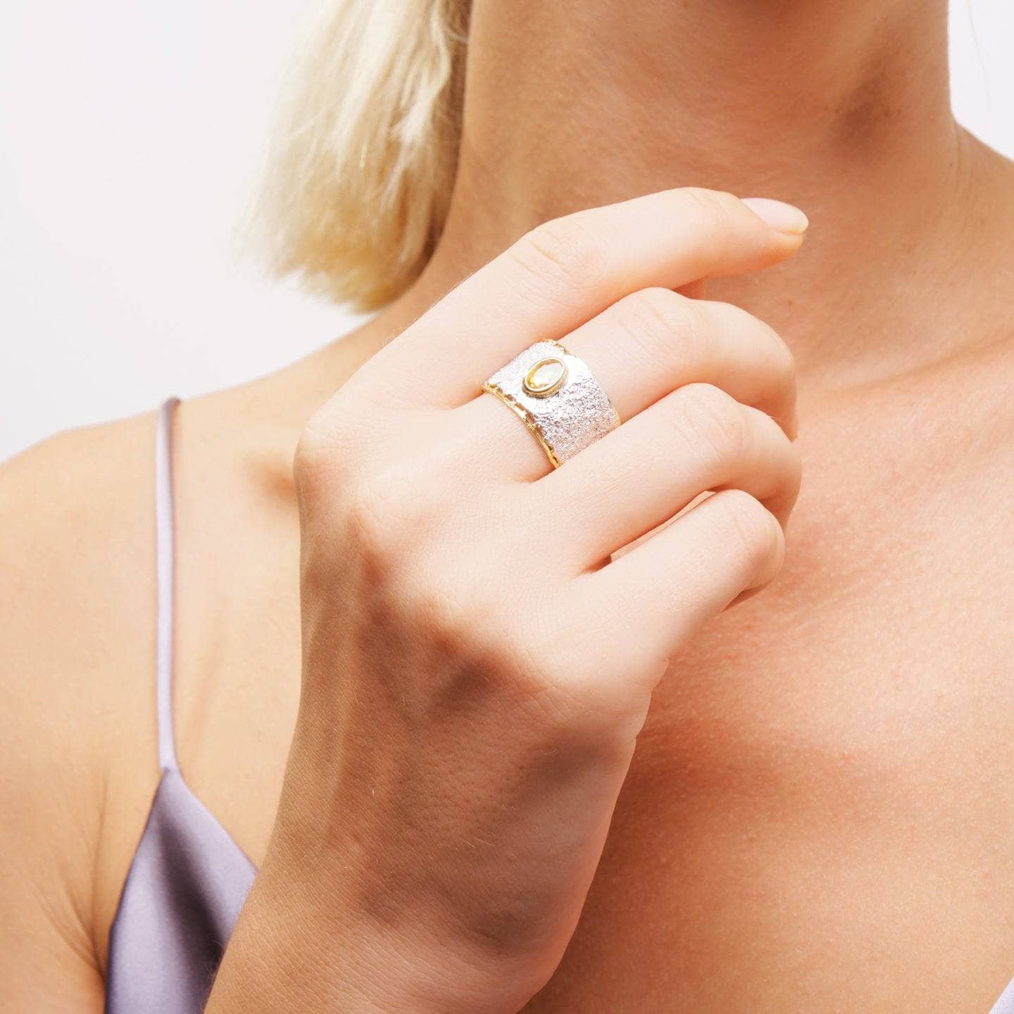 ilith minimalist design textured silver ring with natural oval cut citrine (white rhodium & gold plated) ilith minimalist design textured silver ring with natural oval cut citrine (white rhodium & gold plated)