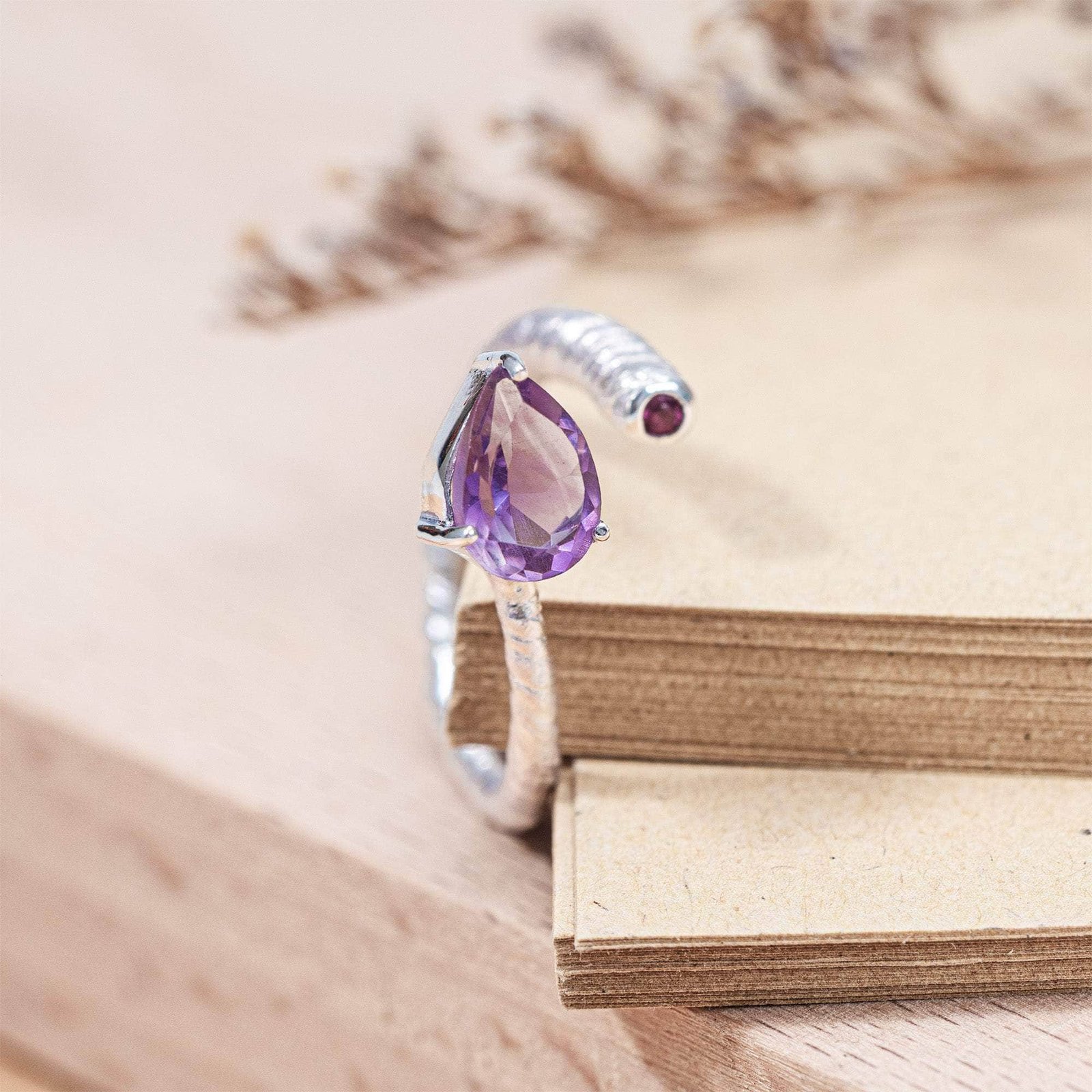 korra open band ring in silver with pear and round cut amethyst and anti tarnish coating korra open band ring in silver with pear and round cut amethyst and anti tarnish coating