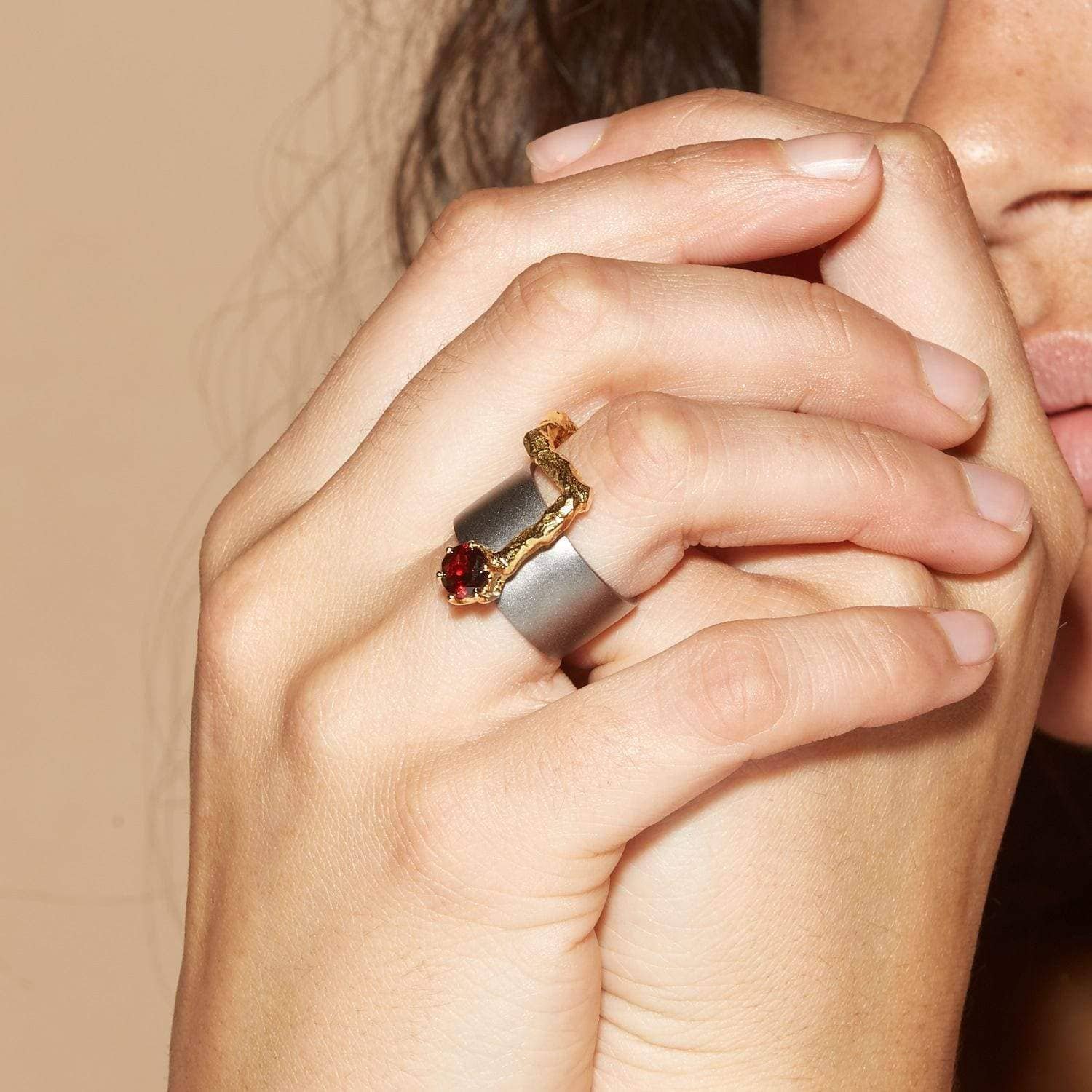 rowena iconic design natural garnet ring in black rhodium and 18k gold plated silver rowena iconic design natural garnet ring in black rhodium and 18k gold plated silver